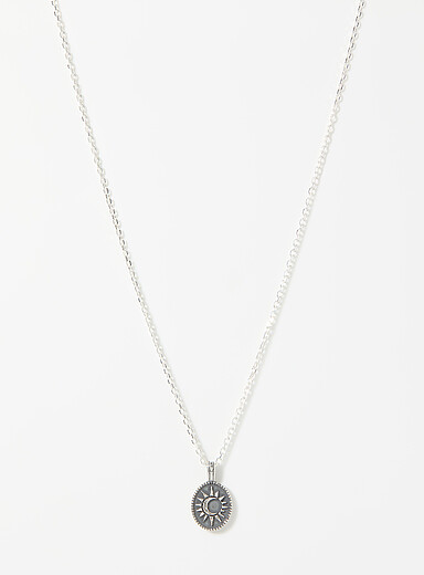 Le collier pendentif lune et soleil