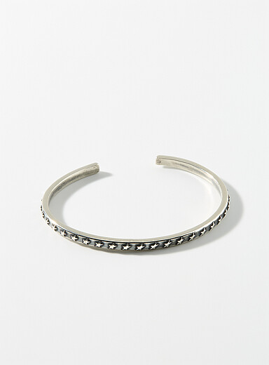 Embossed star open bangle