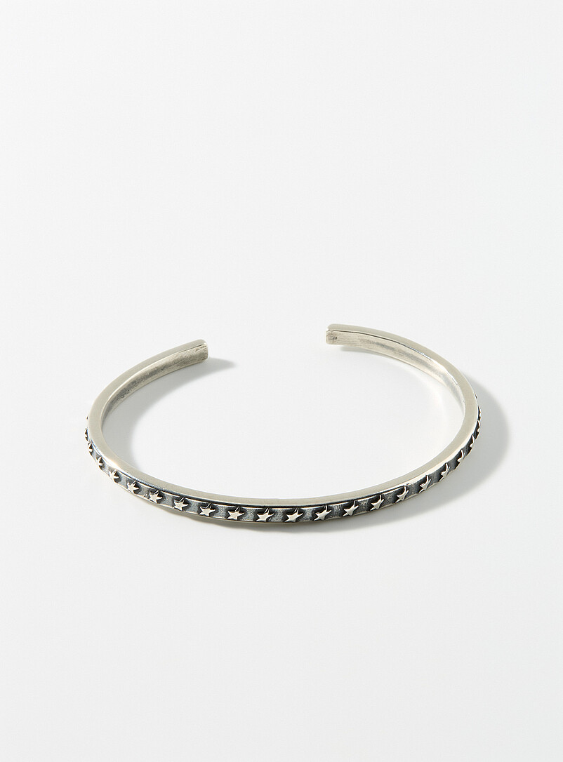 Embossed star open bangle product image (primary)