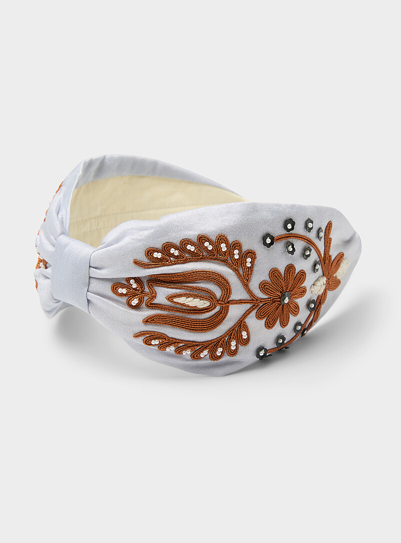Ornamental flower light-blue headband product image (primary)