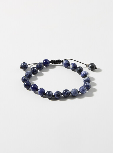 Le bracelet billes en pierre bleue