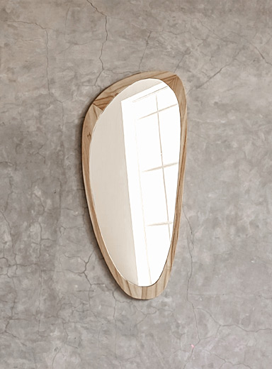 Wood trim asymmetrical mirror