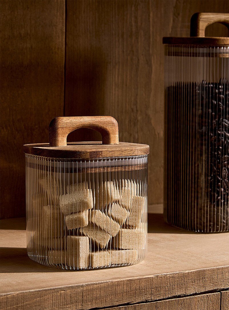 Grooved glass and wood small storage jar product image (primary)