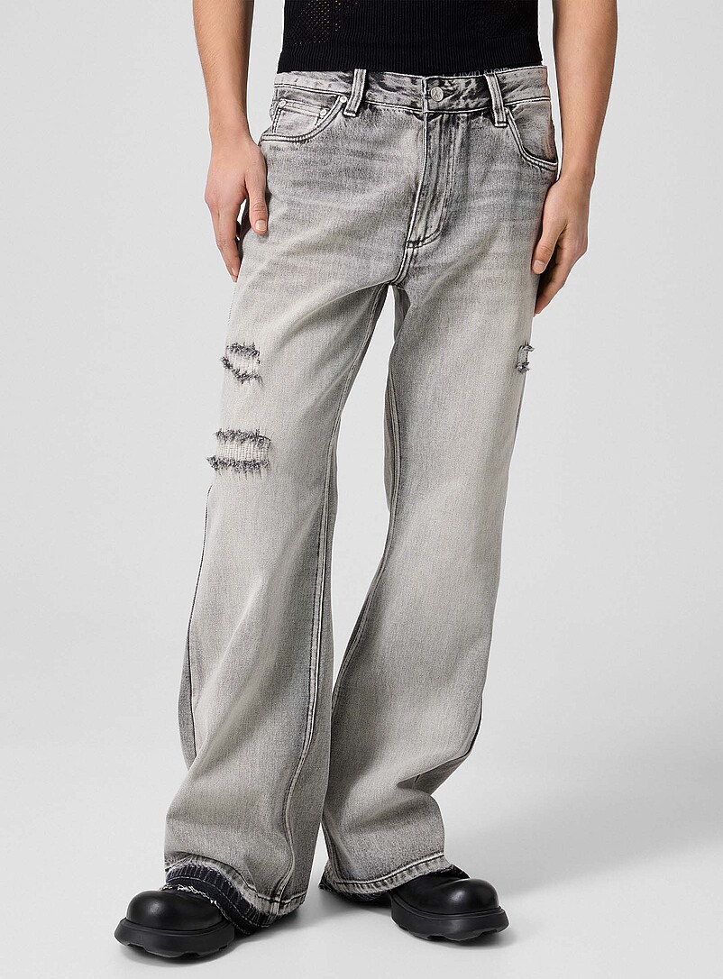 Raw edging mended flared-leg jean product image 2