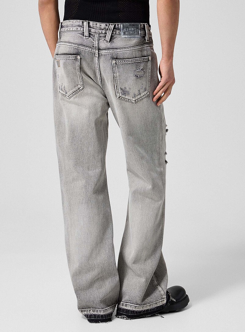 Raw edging mended flared-leg jean product image 3