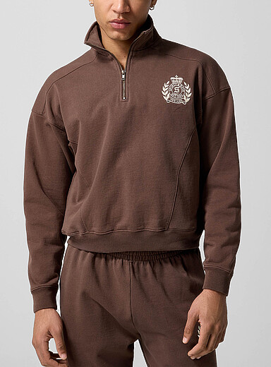 Le sweat &agrave; col zipp&eacute; &eacute;cusson brod&eacute;