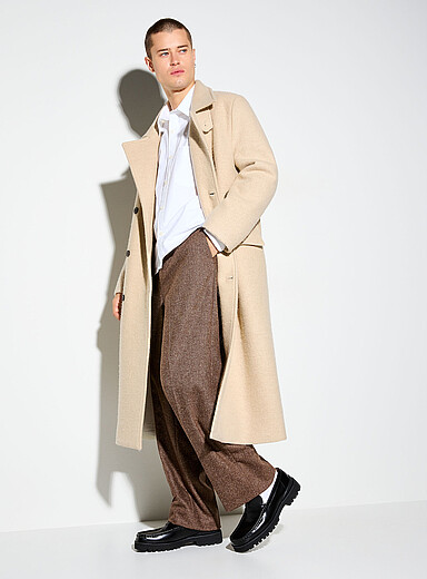 Le pantalon Donegal laine m&eacute;lang&eacute;e Tissu en m&eacute;lange de laine sign&eacute; Marzotto <b>Coupe Paris - D&eacute;contract&eacute;e &agrave; taille haute</b>