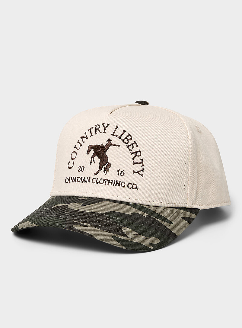 Cowboy-logo camouflage cap product image (primary)