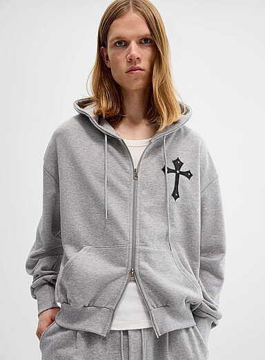 Le kangourou zipp&eacute; molleton ratin&eacute; croix gothique <b>Importation de S&eacute;oul</b>