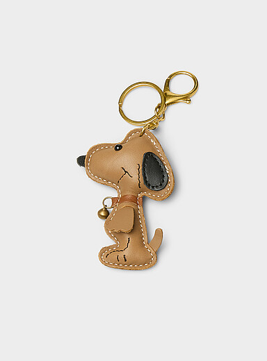 Le porte-cl&eacute;s breloque Snoopy effet cuir