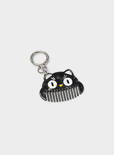 Playful little comb bag charm