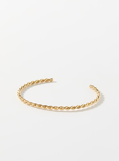 Twisted openwork golden bracelet