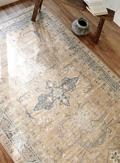 Indaba: Le tapis artisanal m&eacute;daillon ancien Cayman 183 x 274 cm &Eacute;cru &agrave; motifs