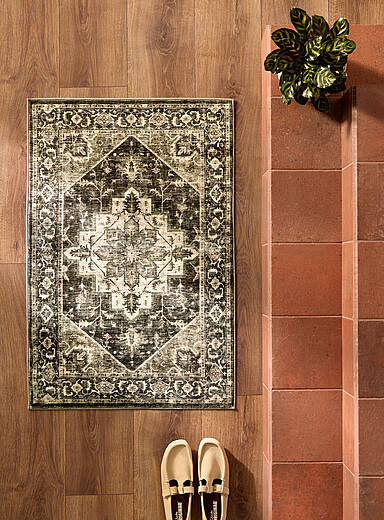 Grey and green Persian-style rug See available sizes