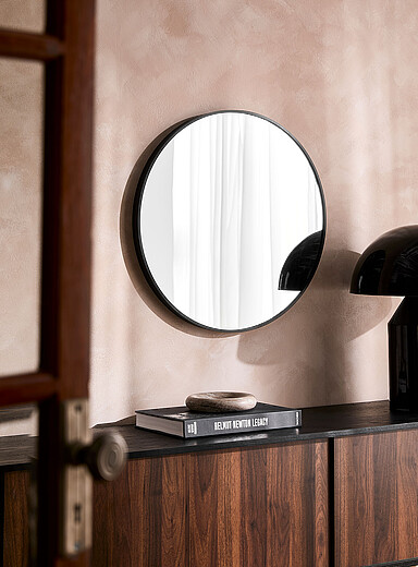 Oval metal frame mirror