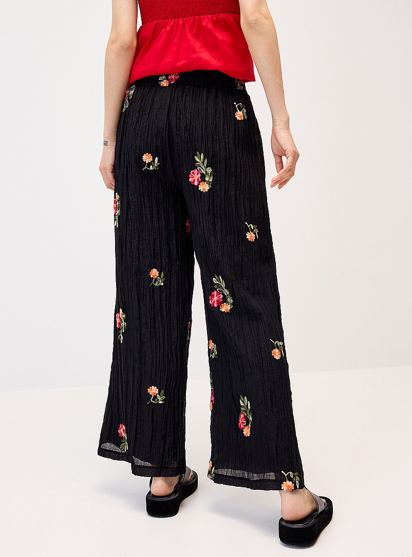 Twik Black Embroidered flowers crinkled pant for women