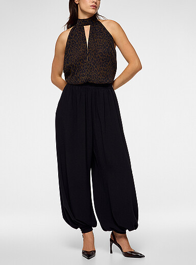 Rotate Black Pleated waist barrel-leg pant for women