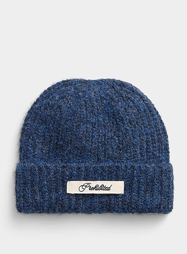 La tuque &agrave; revers tricot chin&eacute; poilu