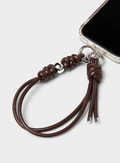 Le bracelet &agrave; t&eacute;l&eacute;phone corde faux cuir et bille