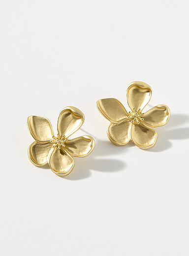 Les boucles d'oreilles fleurs resplendissantes