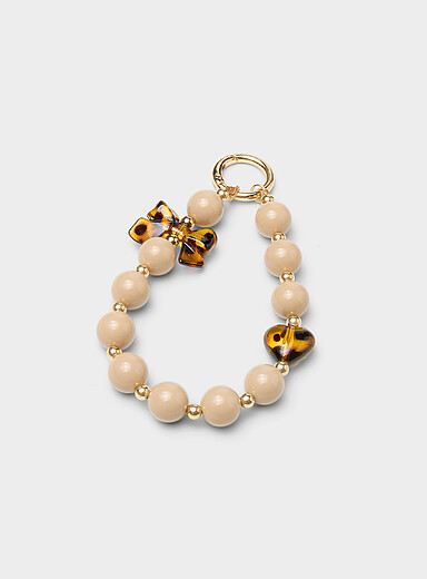 Bow and bead charm
