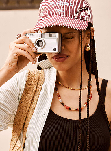 Striped destination baseball cap