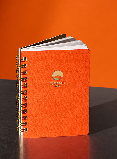 Small tangerine notebook