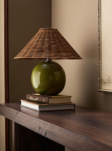 Glazed green stoneware and rattan table lamp