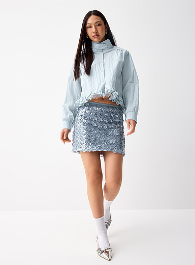 Twik: La minijupe paillettes fleurs Bleu p&acirc;le - Bleu ciel pour femme