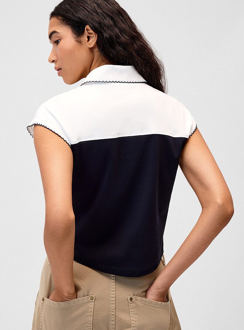 Twik Blue Two-tone scallop-trim polo shirt for women