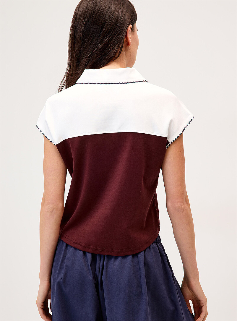 Twik Blue Two-tone scallop-trim polo shirt for women