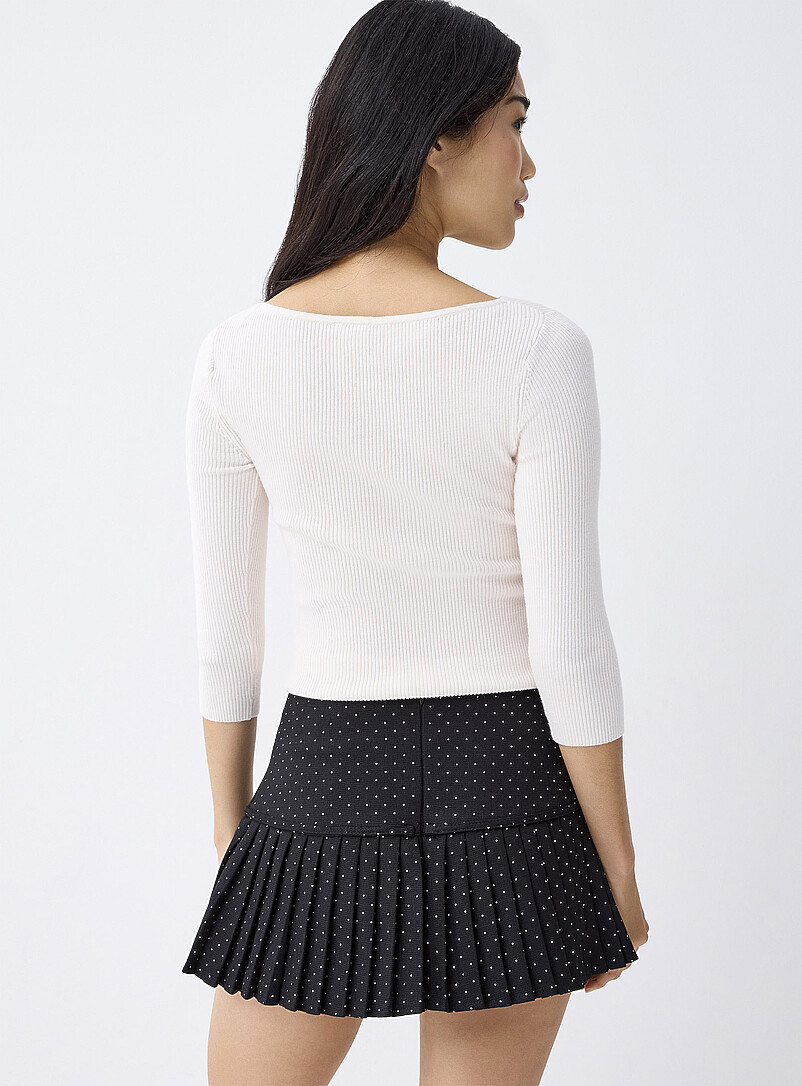 Twik Black Pin dot pleated miniskirt for women