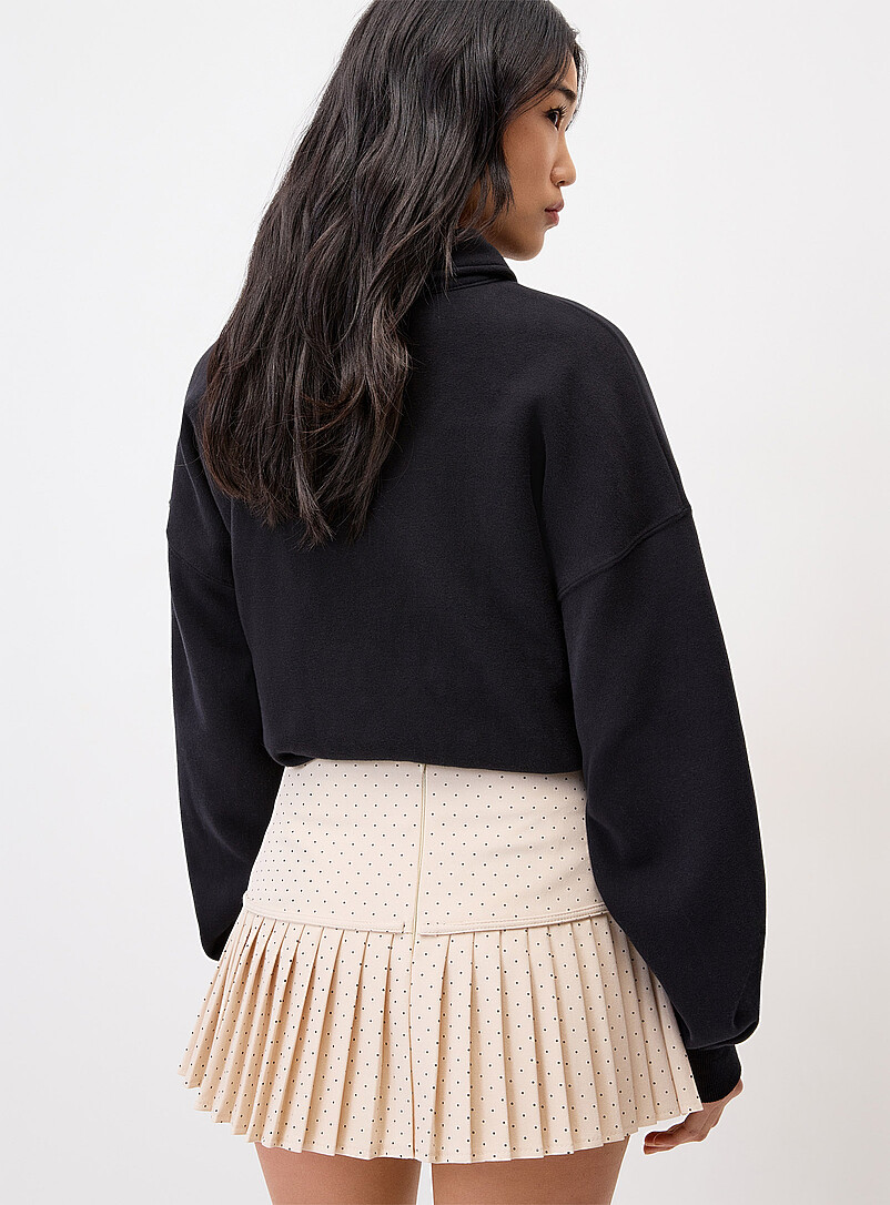 Twik: La minijupe pliss&eacute;e petits pois Noir pour femme