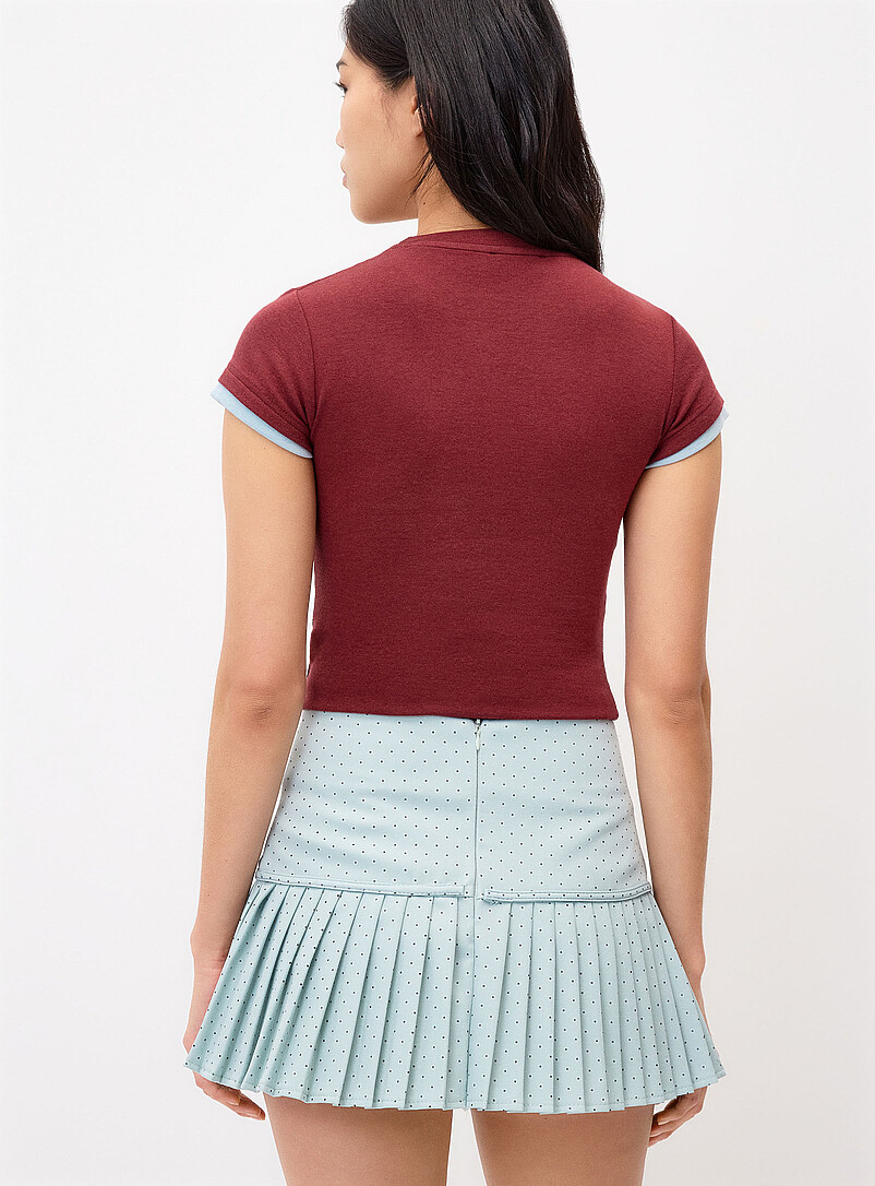 Twik Black Pin dot pleated miniskirt for women