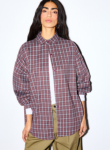 La chemise ample &agrave; carreaux manches bouffantes