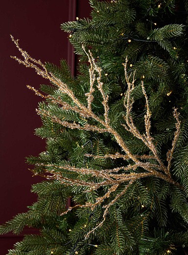 La branche d&eacute;corative effet givr&eacute; <b>Collection de No&euml;l</b>