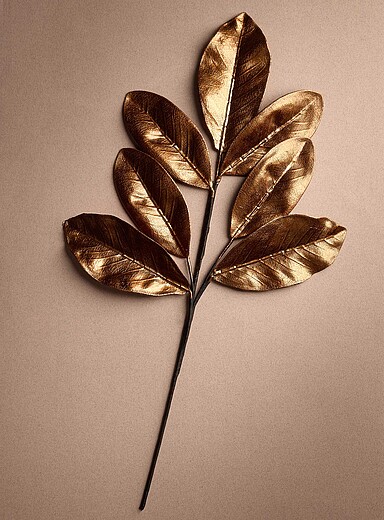 La branche d&eacute;corative feuilles aspect m&eacute;tallique <b>Collection de No&euml;l</b>