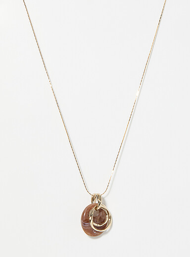 Long oval pendant necklace with rings