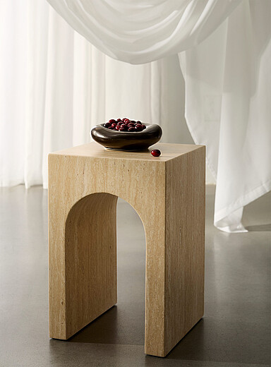 Arch travertine-finish concrete side table