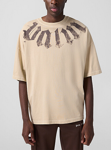 Palm Angels: Le t-shirt ample logo vieilli Ivoire - Beige cr&egrave;me pour homme