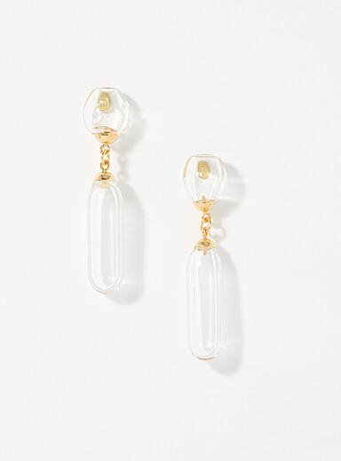 Les boucles d'oreilles tubes et bulles de verre clair