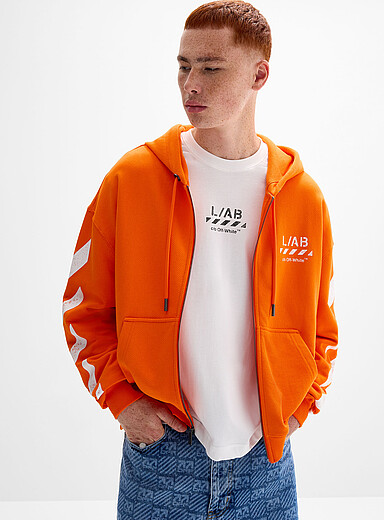 L/AB c/o Off-White: Le kangourou zipp&eacute; manches signature diagonale <b>Coupe ample</b> Orange pour homme