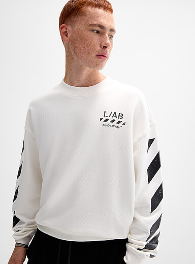 Diagonal signature sleeve sweatshirt <b>Loose fit</b>