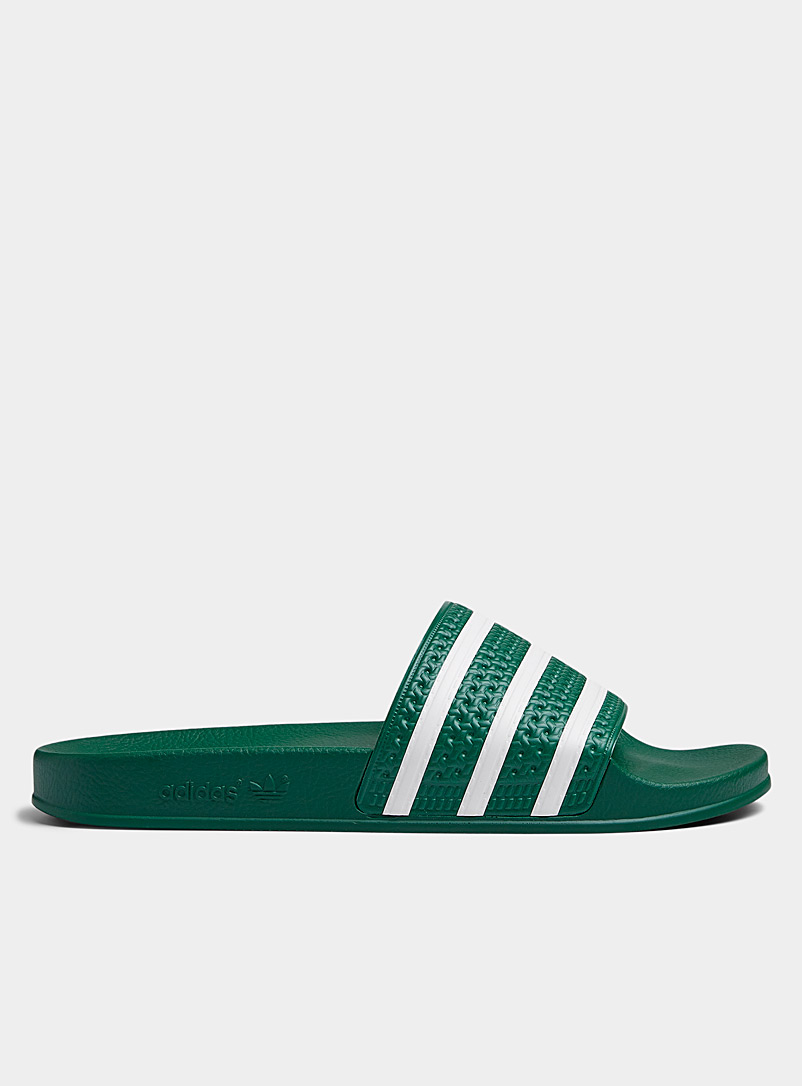 Adidas Originals: La sandale slide Adilette vert collégial Homme Vert pour homme