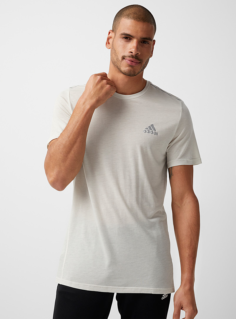 Adidas: Le t-shirt touche de laine X-City beige Sable pour homme