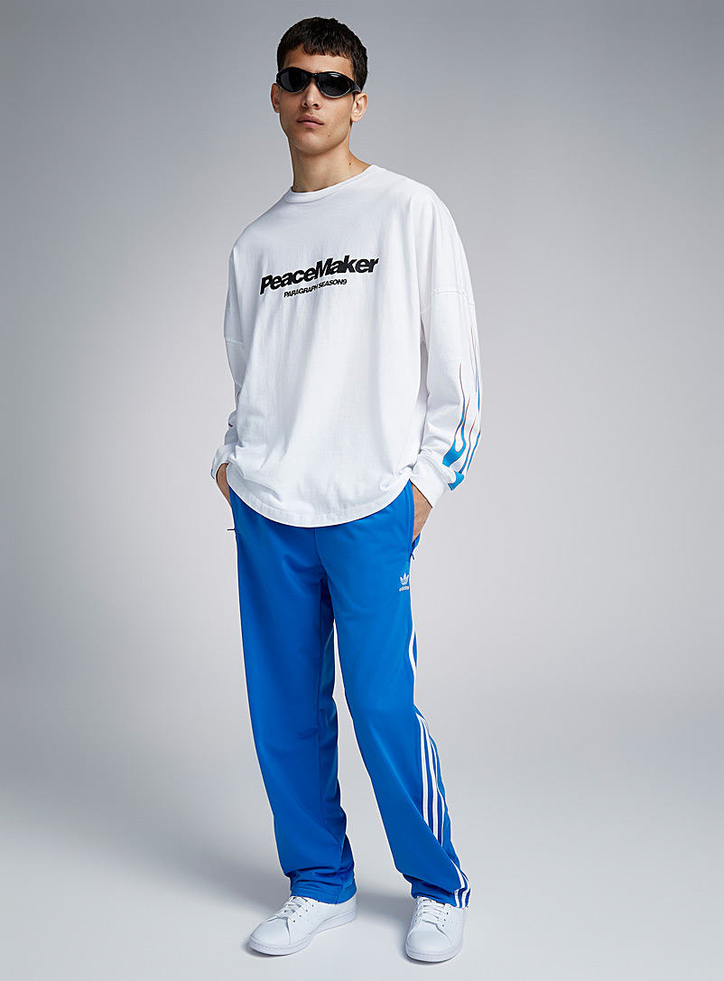 Adidas Originals: Le pantalon <i>track</i> Firebird Bleu royal-saphir pour homme