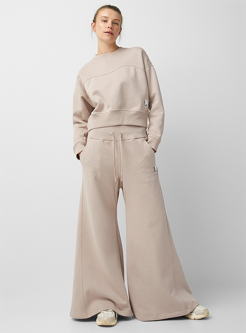 Adidas: Le pantalon jambe large Lounge Brun pâle-taupe pour femme