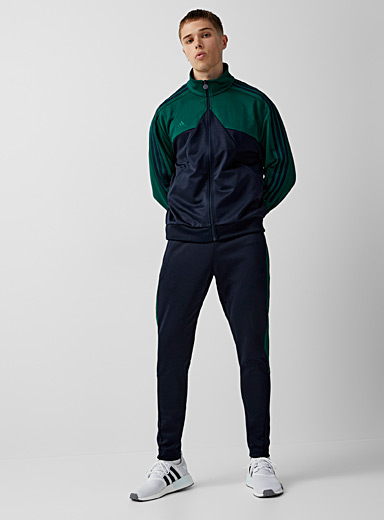 Adidas: Le pantalon 3 bandes vert impérial Tiro Marine pour homme