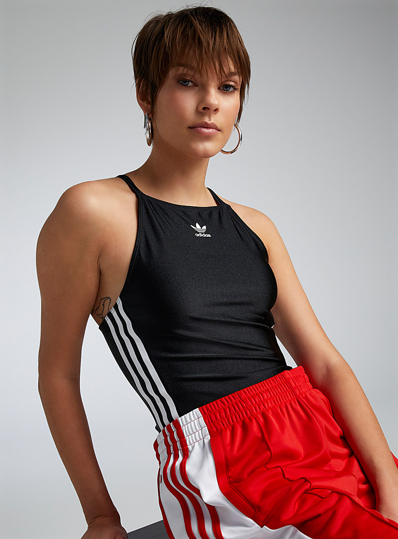 Adidas Originals: Le justaucorps lustré à rayures Noir pour femme