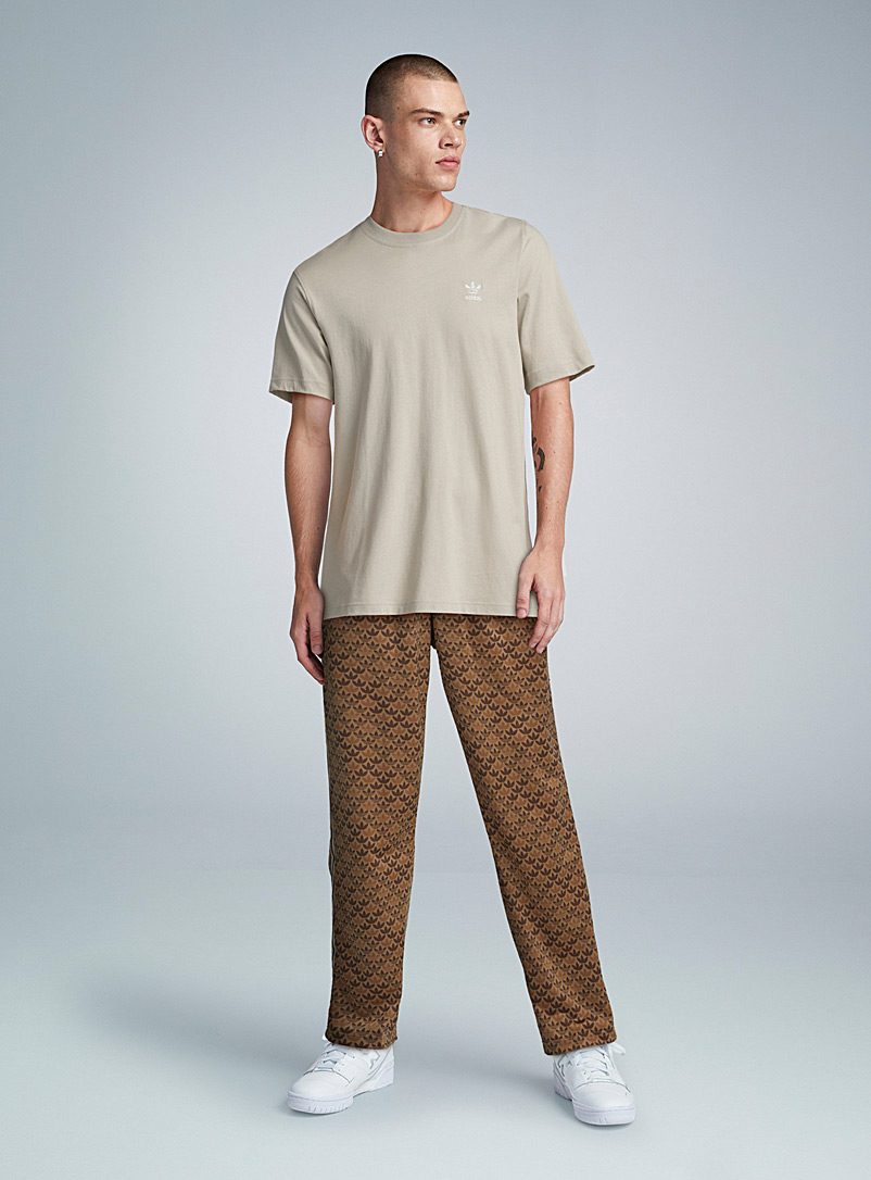 Adidas Originals: Le pantalon <i>track</i> monogramme Brun pour homme